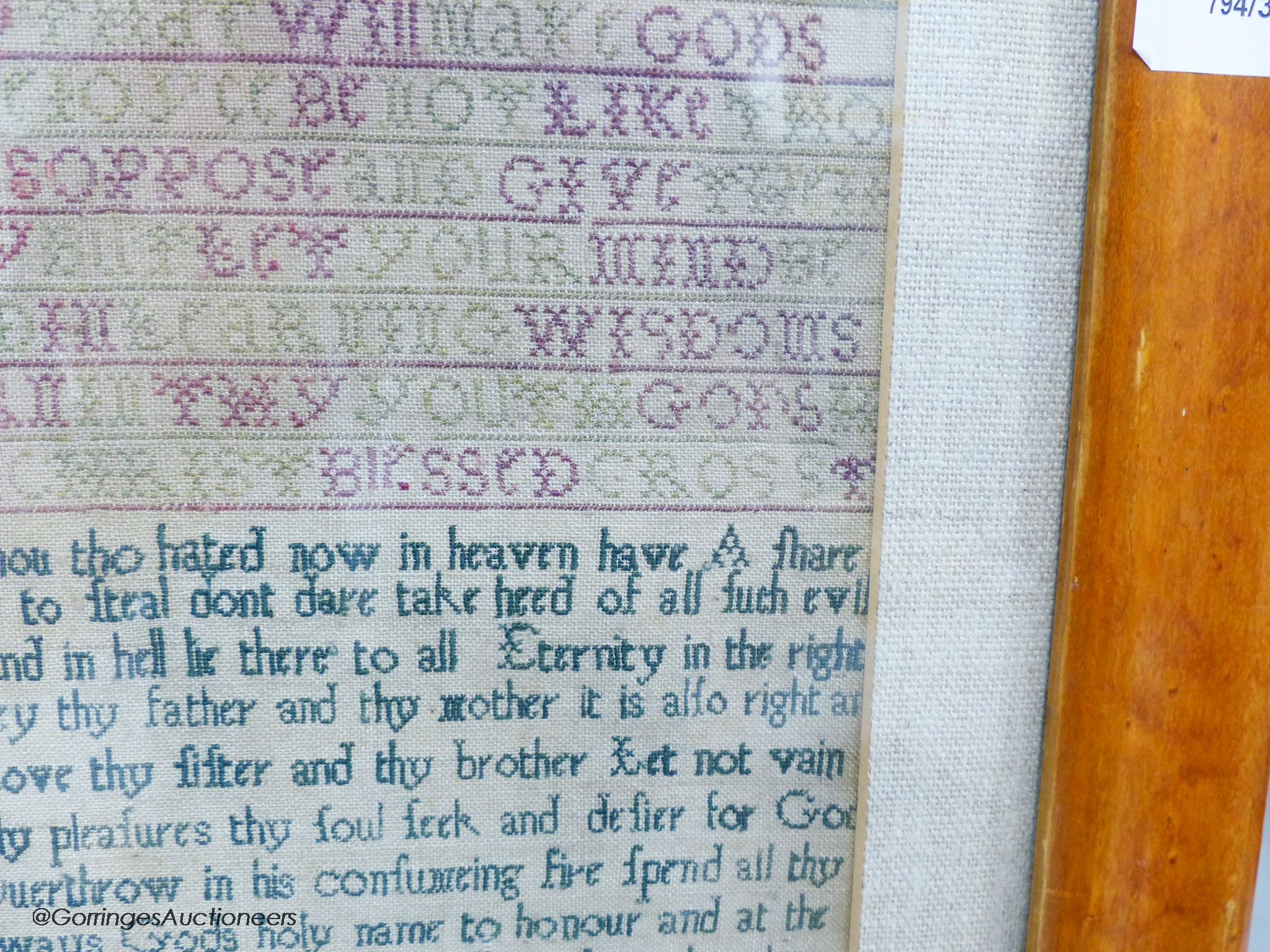 A George II needlework sampler, worked with the Lord's Prayer and religious text, by Alice Wood, dated 1736, 40 x 20cm